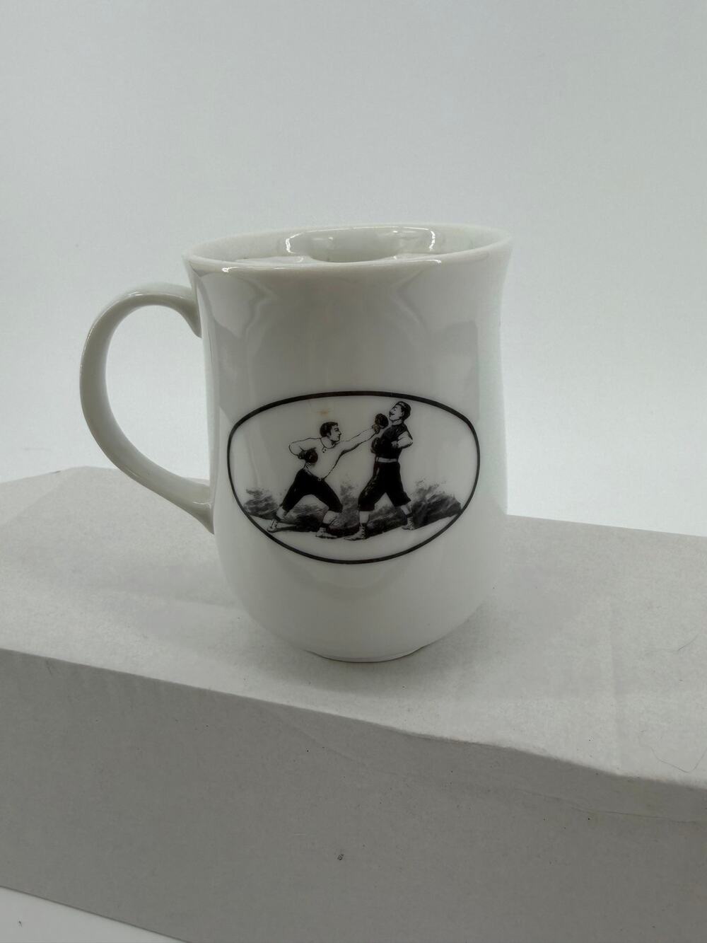 Porcelain coffee mug, Victoriana Collection The Strongman